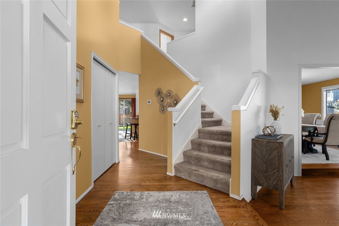 4603 Northeast 19th Street Renton, WA 98059 - Photo 5 of 30 a view of entryway and hall with wooden floor