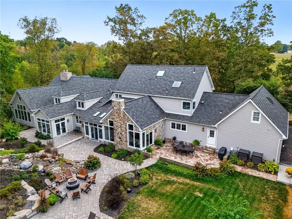an aerial view of a house with a garden