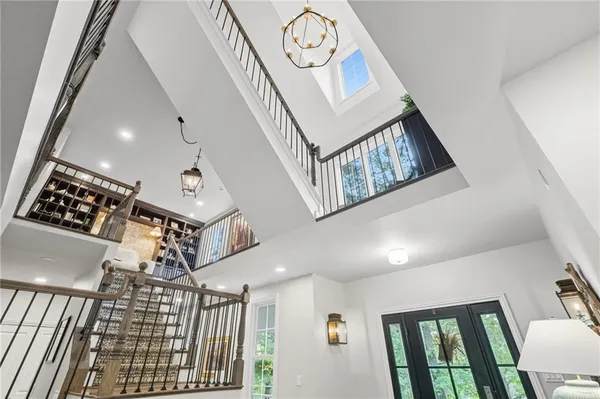 a view of entryway with stairs and wooden floor