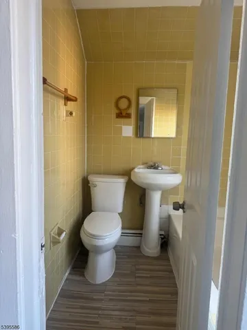 a bathroom with a sink and a toilet