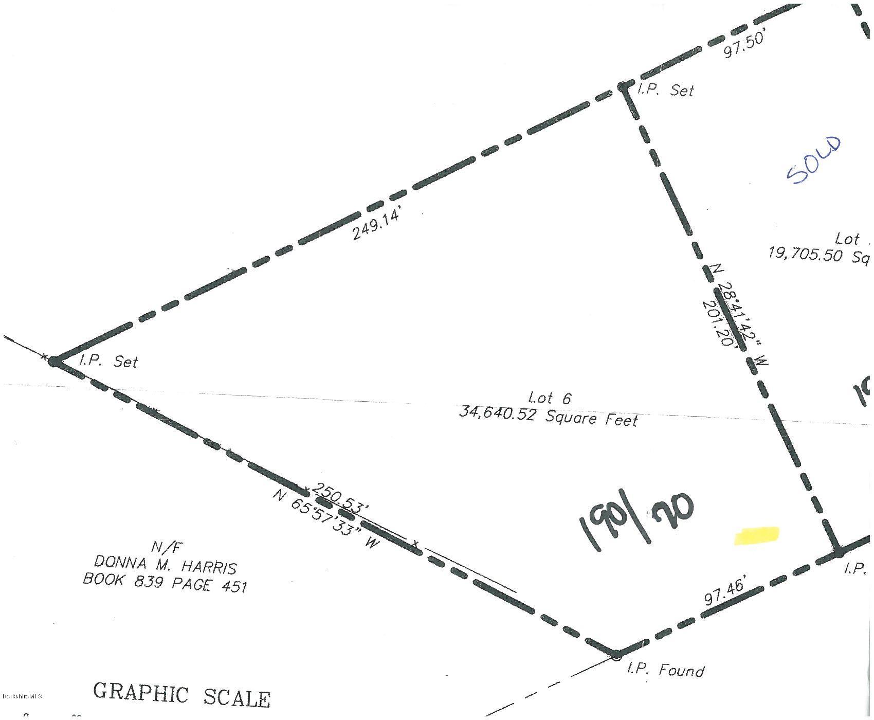 a picture of a wall with a white house