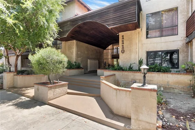 an aerial view of multiple houses with outdoor space