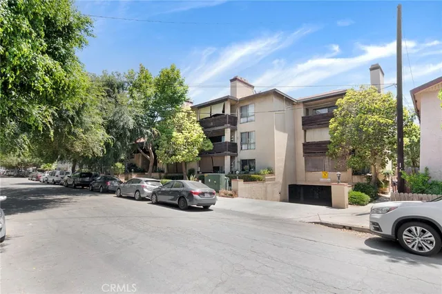 an aerial view of a city with lots of residential buildings