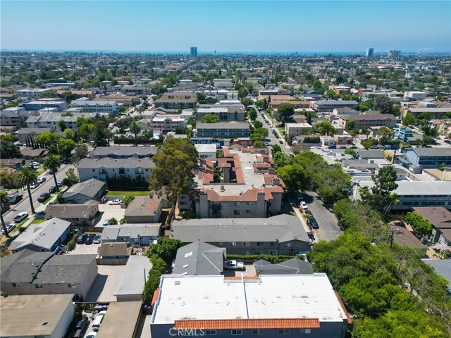 an aerial view of a city with lots of residential buildings