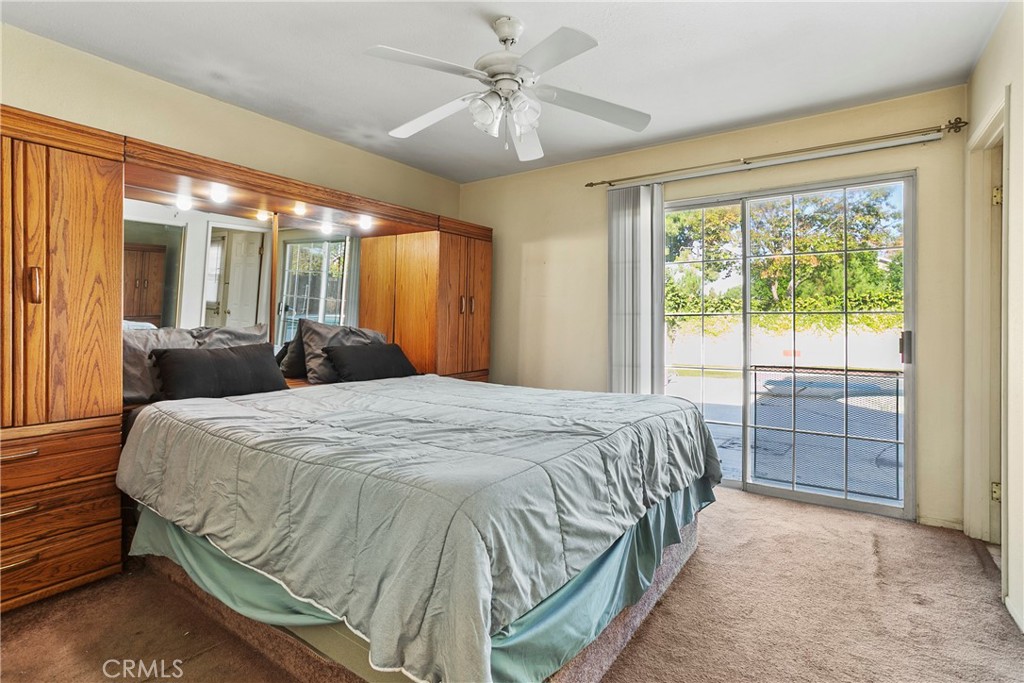 4801 Redbluff Circle Irvine, CA 92604 - Photo 12 of 34 a bed sitting in a bedroom next to a window