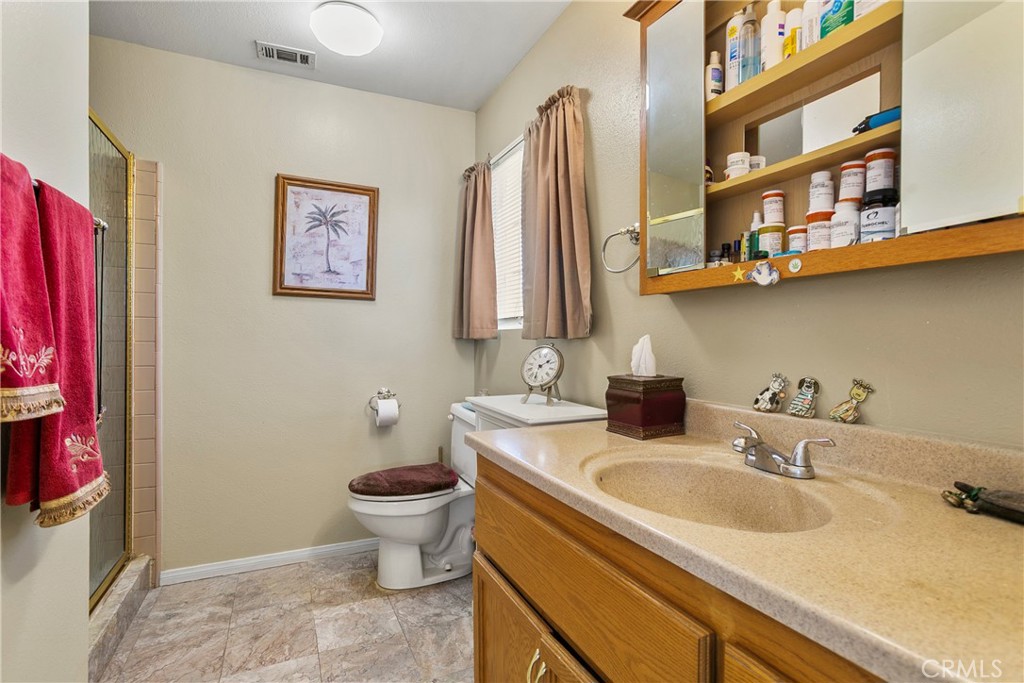 4801 Redbluff Circle Irvine, CA 92604 - Photo 18 of 34 a bathroom with a sink and a toilet