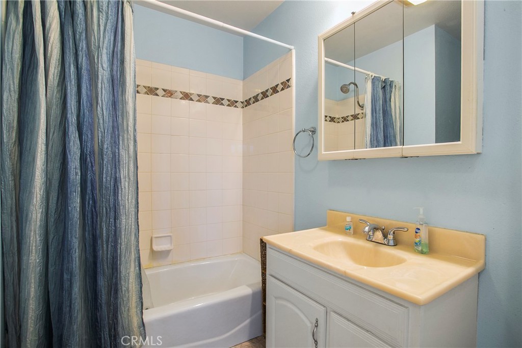4801 Redbluff Circle Irvine, CA 92604 - Photo 24 of 34 a bathroom with a sink and a bathtub