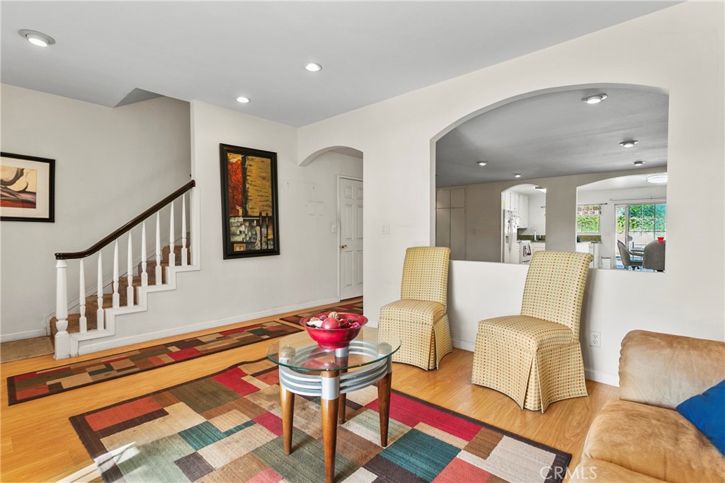 4801 Redbluff Circle Irvine, CA 92604 - Photo 4 of 34 a living room with furniture and a dining table