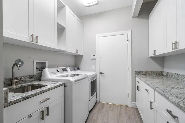 a bedroom with a bed and a window with outer view