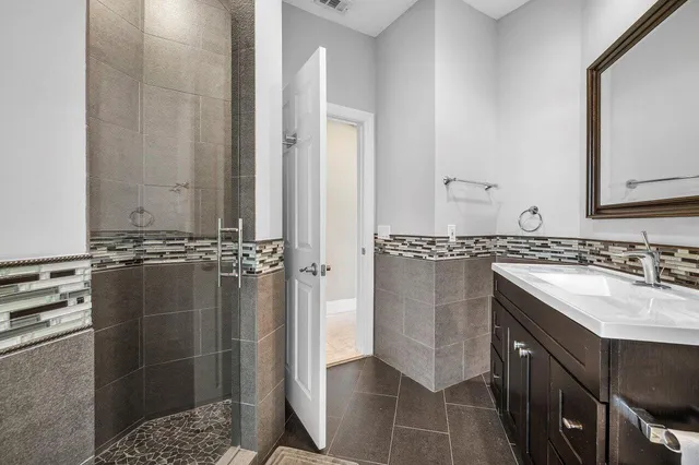 a view of a swimming pool with an outdoor space and seating area