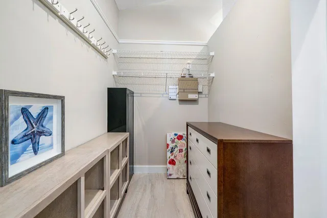 a view of a house with swimming pool and sitting area