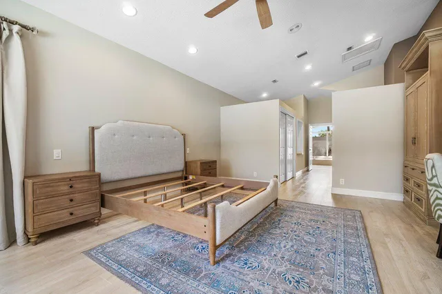 an aerial view of ocean with residential house swimming pool and outdoor space