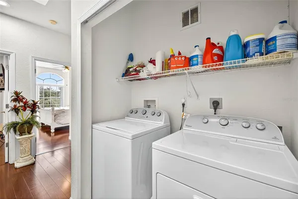 a utility room with dryer and washer