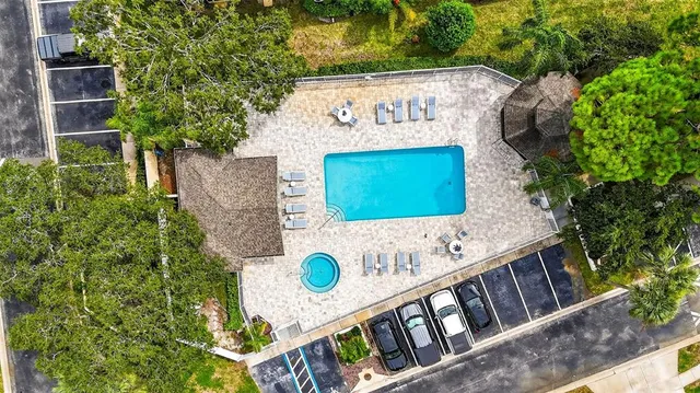a view of outdoor space with signage and flags