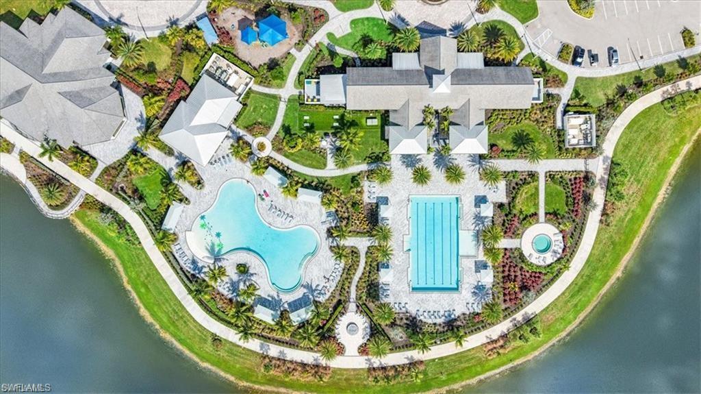 4644 Centaurus Circle Naples, FL 34120 - Photo 35 of 37 Drone / aerial view of a pool area