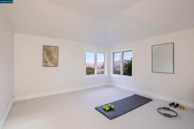 a workspace with furniture and window