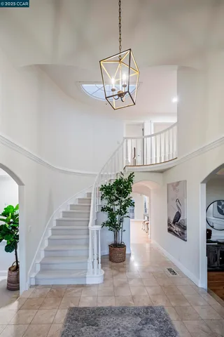 a view of a living room and hardwood floor