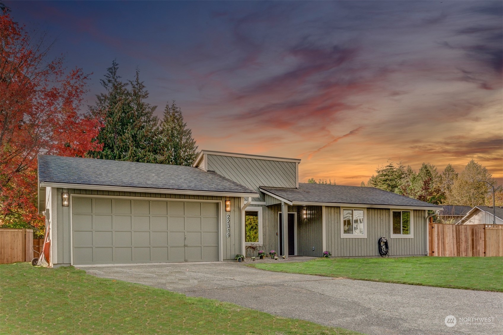 22319 18th Avenue Southeast Bothell, WA 98021 - Photo 1 of 34 a front view of a house with a garage