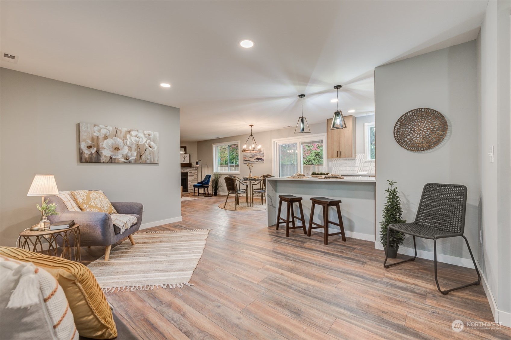 22319 18th Avenue Southeast Bothell, WA 98021 - Photo 2 of 34 a living room with furniture and a wooden floor