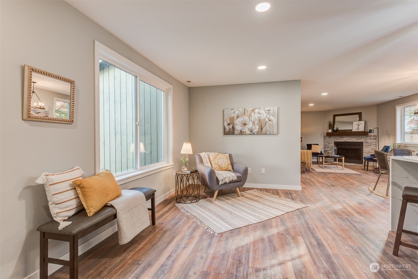 22319 18th Avenue Southeast Bothell, WA 98021 - Photo 3 of 34 a living room with furniture and a table