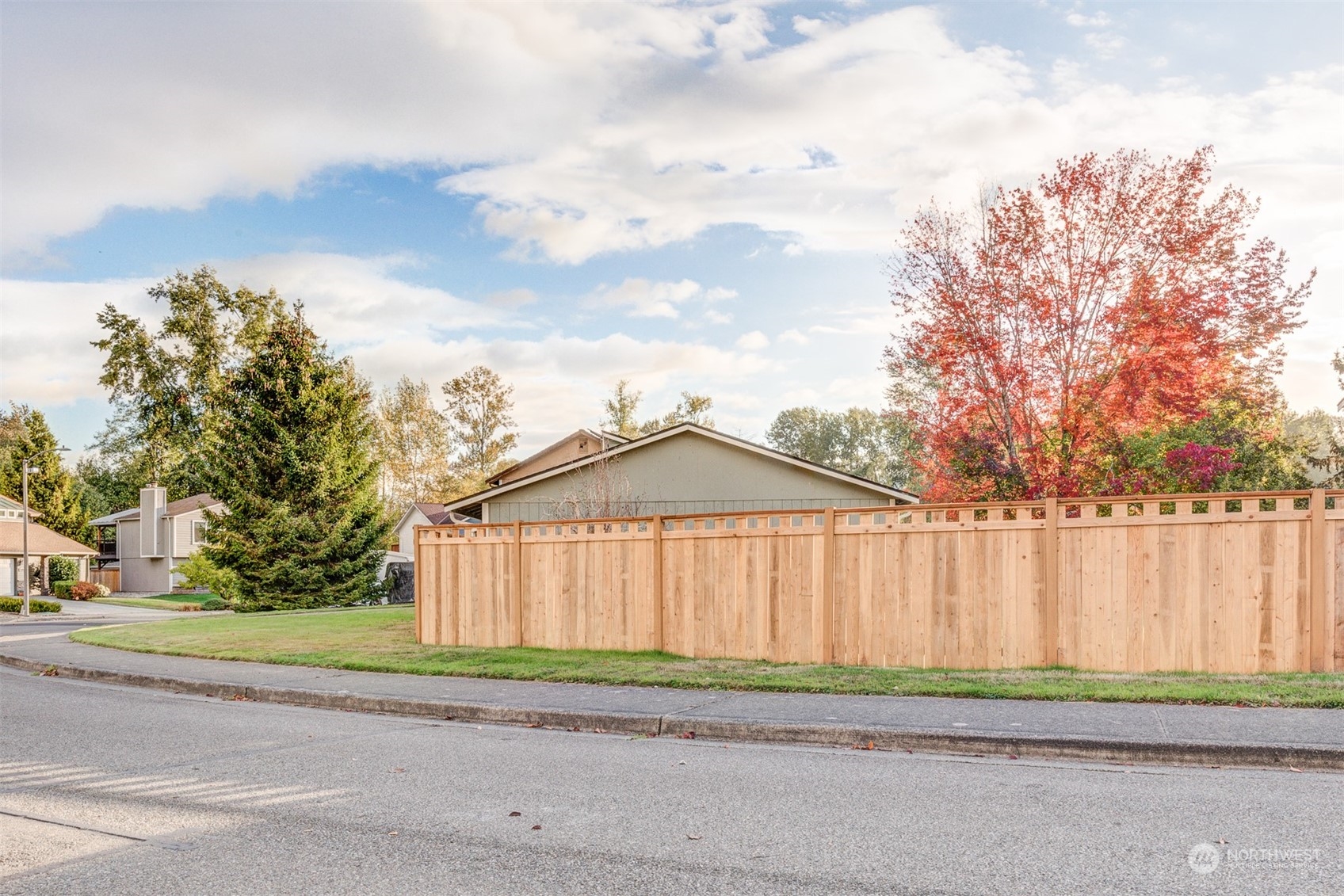 22319 18th Avenue Southeast Bothell, WA 98021 - Photo 32 of 34 a view of a house with a yard and large trees