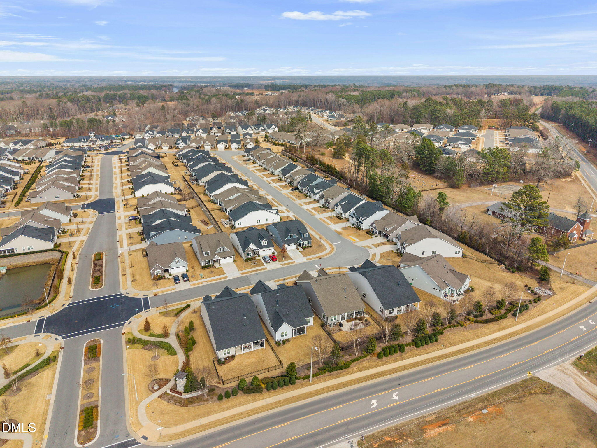 118 Mahogany Raleigh, NC 27610 - Photo 49 of 74 an aerial view of residential building and parking space