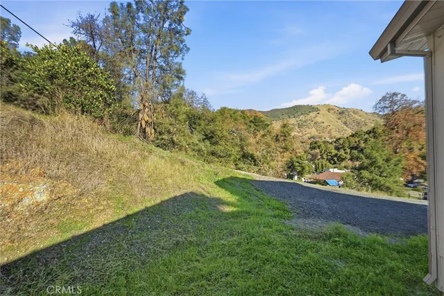 an aerial view of a house with a garden