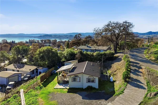 an aerial view of a house with a garden
