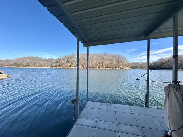 a view of swimming pool with seating space