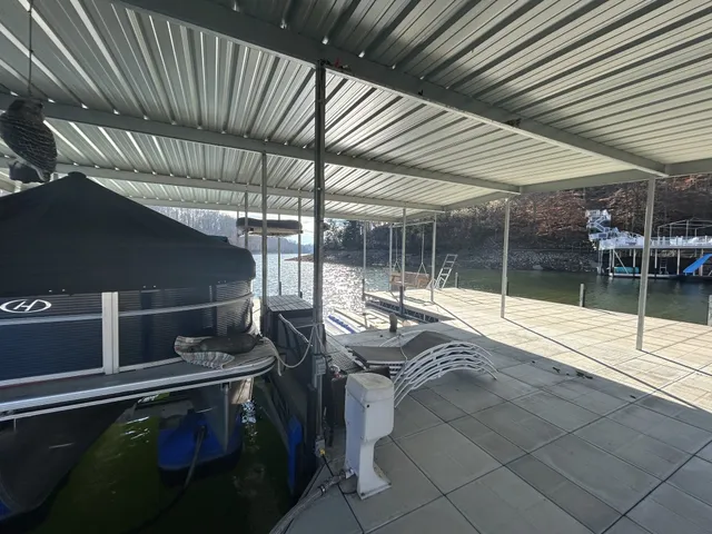 a brick building with a bench in front of it