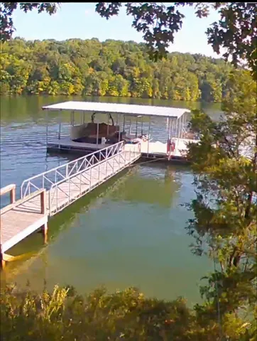 a view of a swimming pool with an ocean view
