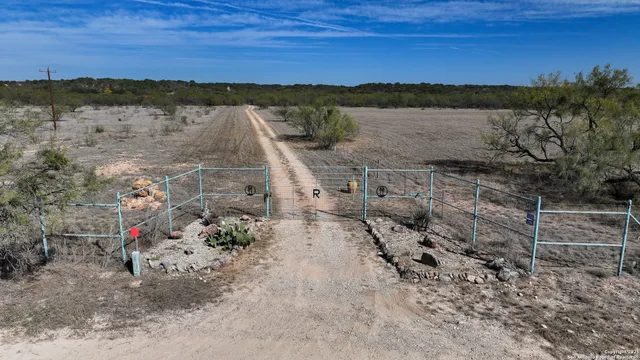 a view of lake with mountain in background