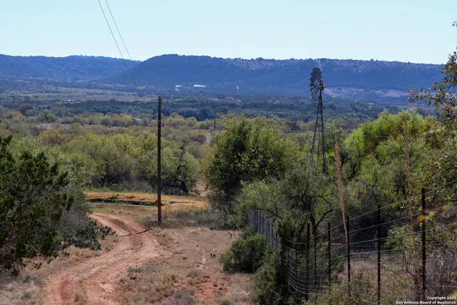 a view of a city with a yard