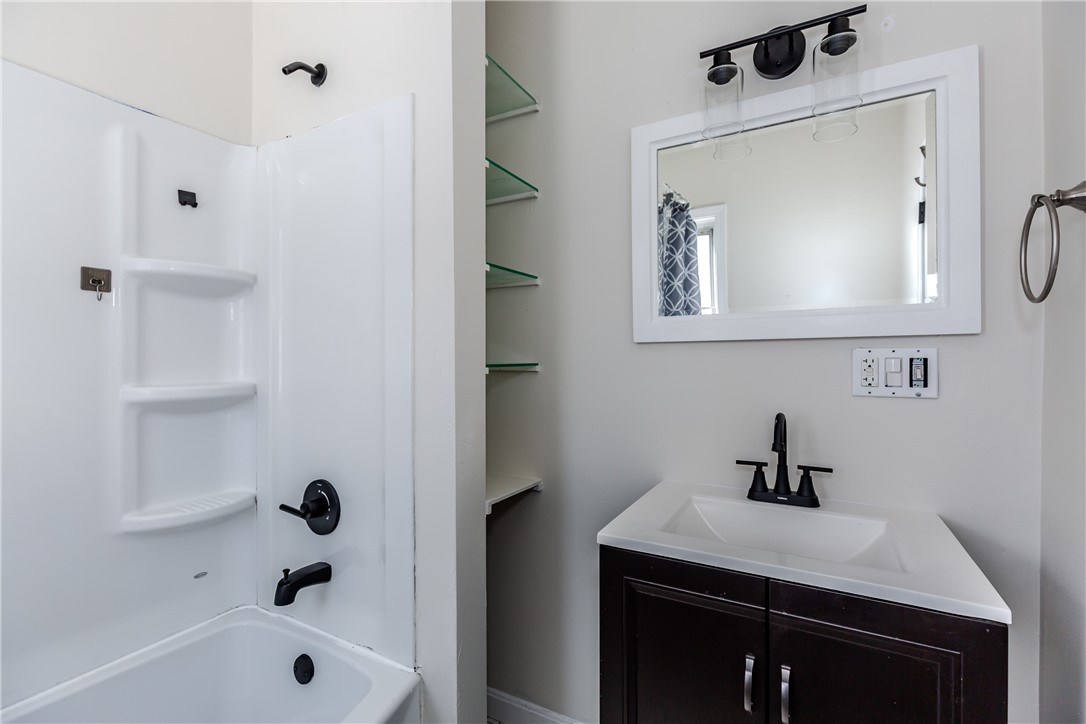 31 Anthony Street Coventry, RI 02816 - Photo 16 of 29 Bathroom (curtain open)