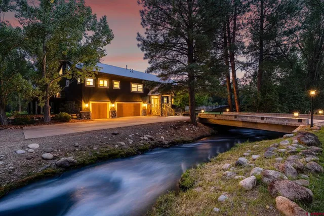 a view of a lake with swimming pool
