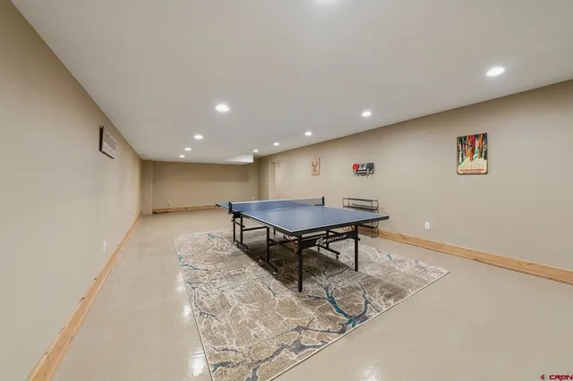 a room with furniture and a rug