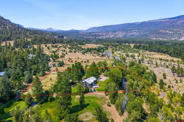 a view of a city with mountain