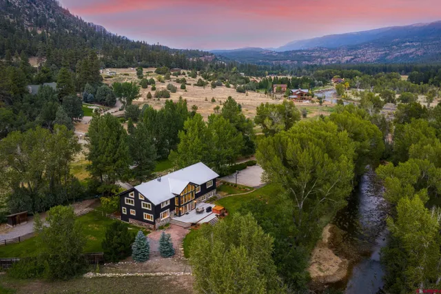 a view of a city with mountains in the background