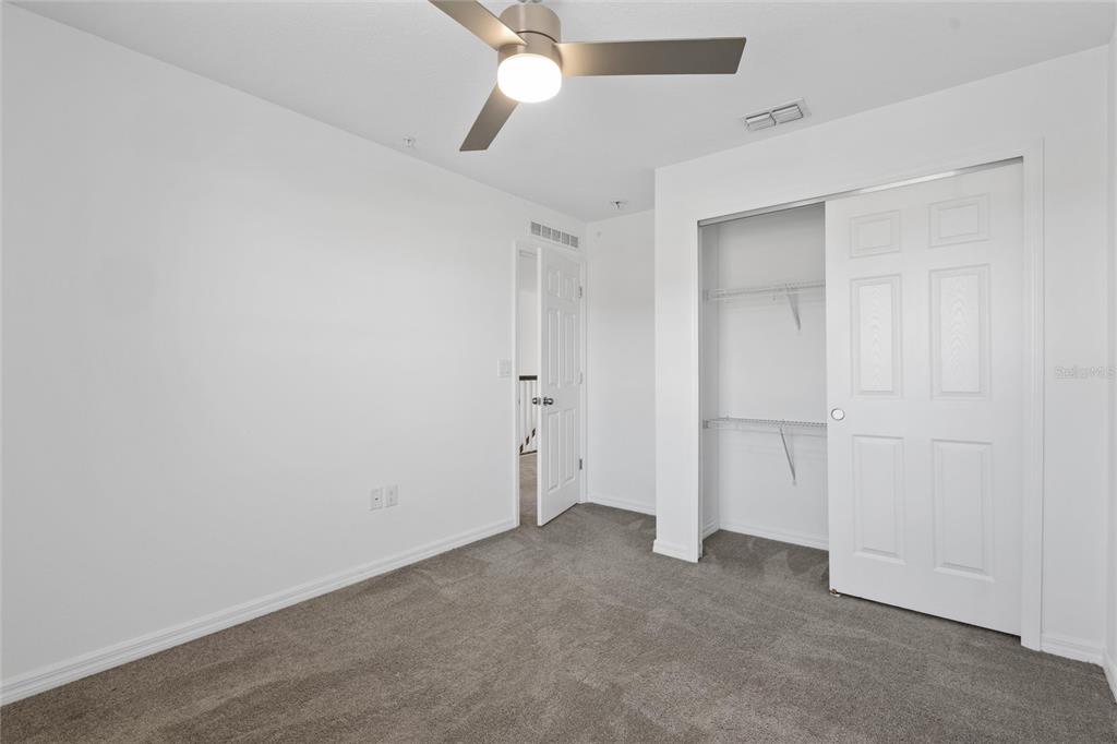 10251 Highline Crest Street Orlando, FL 32832 - Photo 28 of 35 wooden floor in an empty room