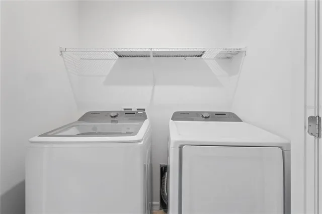 a picture of a bathroom with a shower