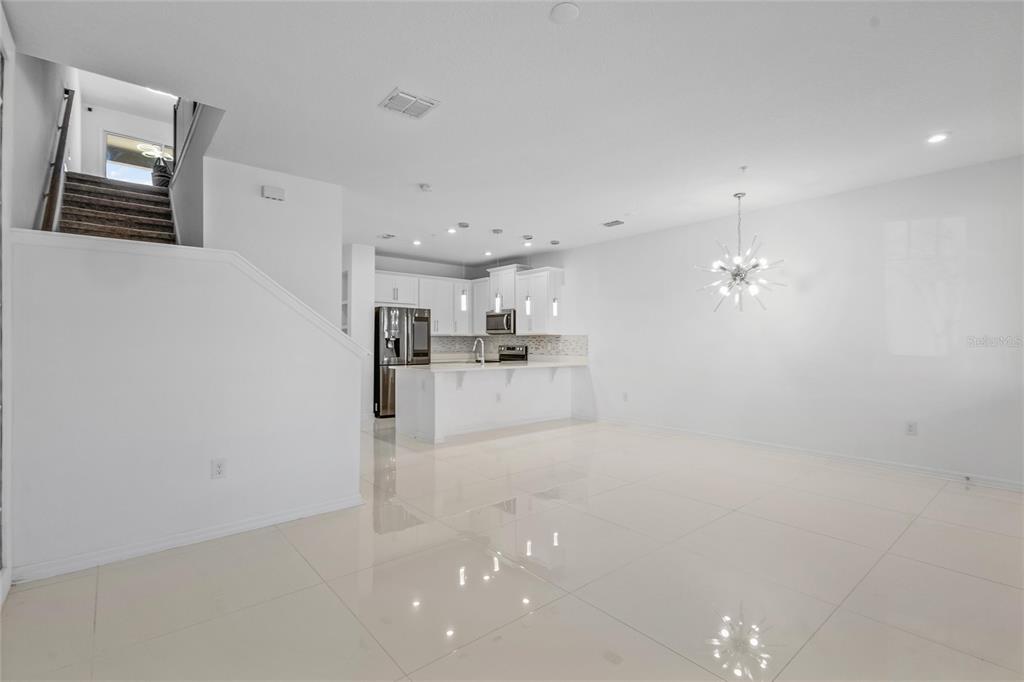 10251 Highline Crest Street Orlando, FL 32832 - Photo 31 of 35 a view of a kitchen with a sink and cabinets