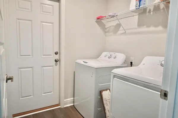 a utility room with dryer and washer