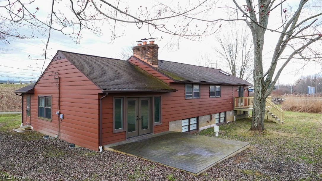 3235 Chapel Road Ashtabula, OH 44004 - Photo 12 of 13 Rear view of property featuring french doors and a deck