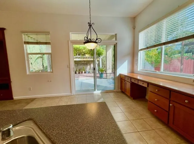 a bathroom with a toilet and a bath tub