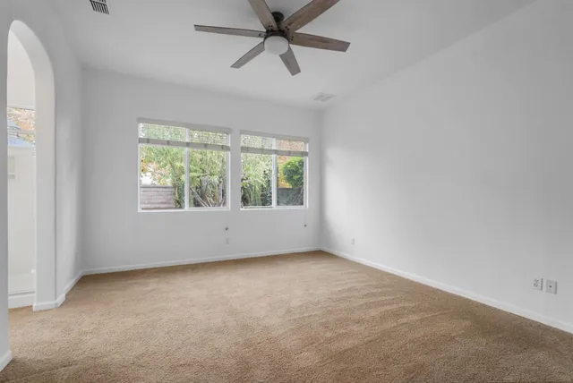 a backyard of a house with lots of green space
