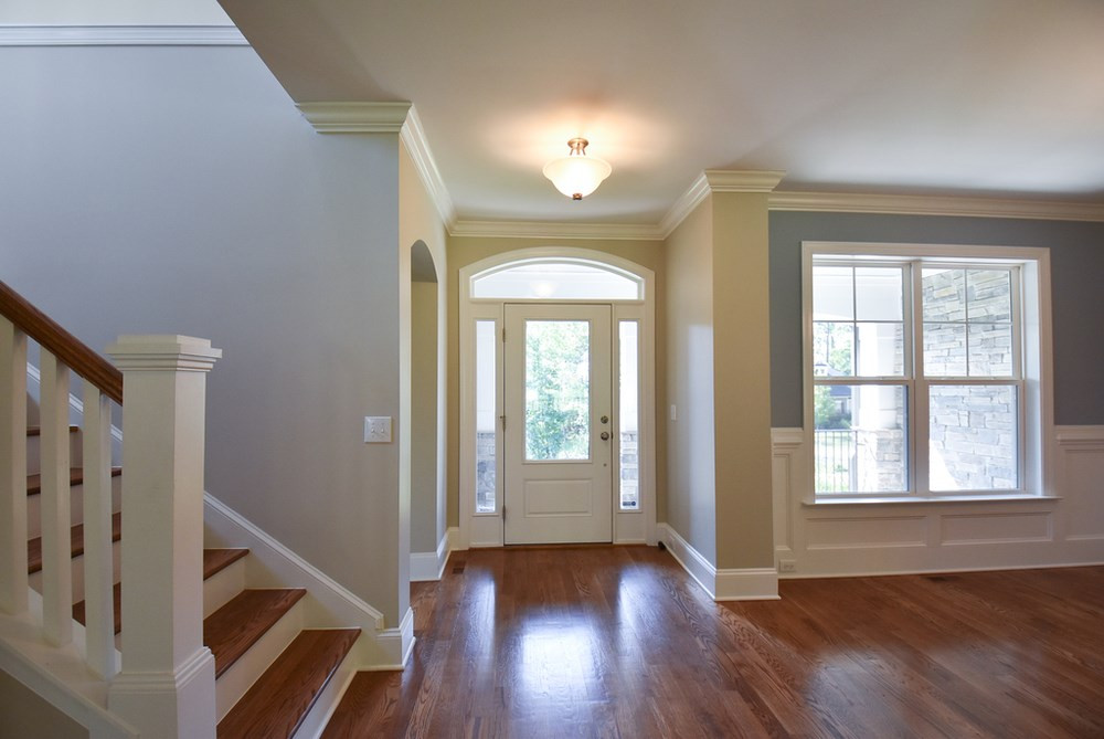 2008 Bowling Green Trail Raleigh, NC 27613 - Photo 29 of 30 9’ smooth ceilings, crown molding & hardwood floors throughout main level. Very open floorplan w/gracious Entry w/arched transom, sidelights & coat closet. Entry
