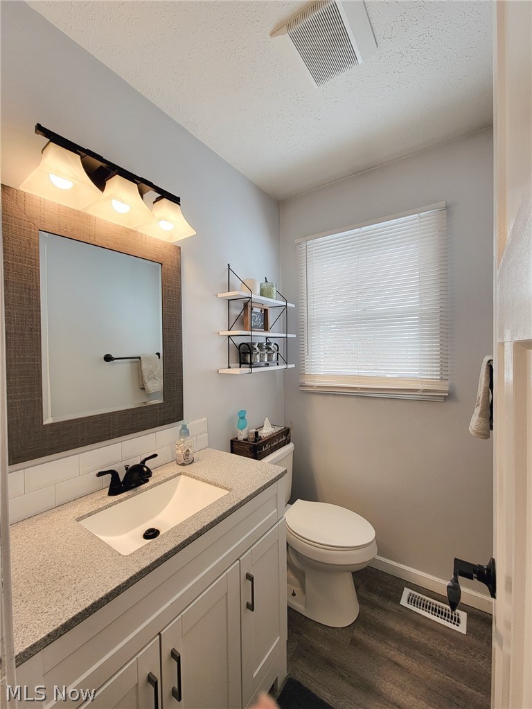 6087 Hanna Road Ravenna, OH 44266 - Photo 17 of 34 First floor half bath just off the kitchen.