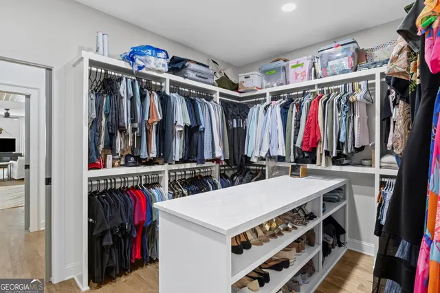 a view of a balcony with table and chairs