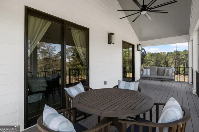 an aerial view of a house with a yard and garden