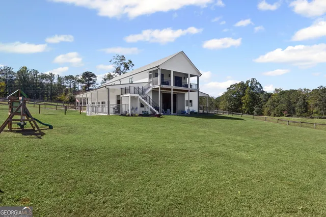 a view of a swimming pool and lounge chair